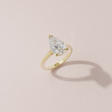 Alliance solitaire poire - or jaune